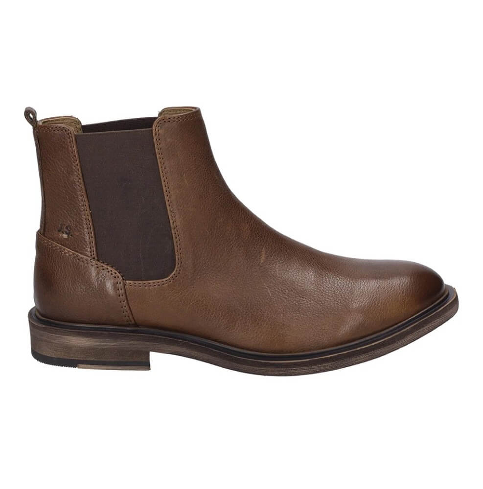 A Josef Seibel brown leather Chelsea boot with elastic side gore panels, shown in a side profile view against a plain white background.
