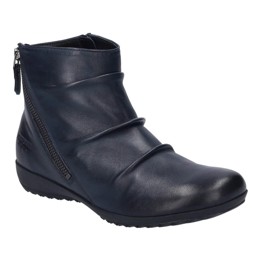 A Josef Seibel Navy leather ankle boot with chunky lug soles and a block heel, shown on a plain white background.