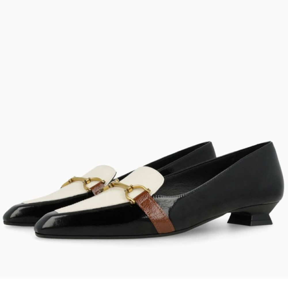 Black and white shoe with gold and brown strap on a white background LODI BED5530 Leather Loafer Black & Cream