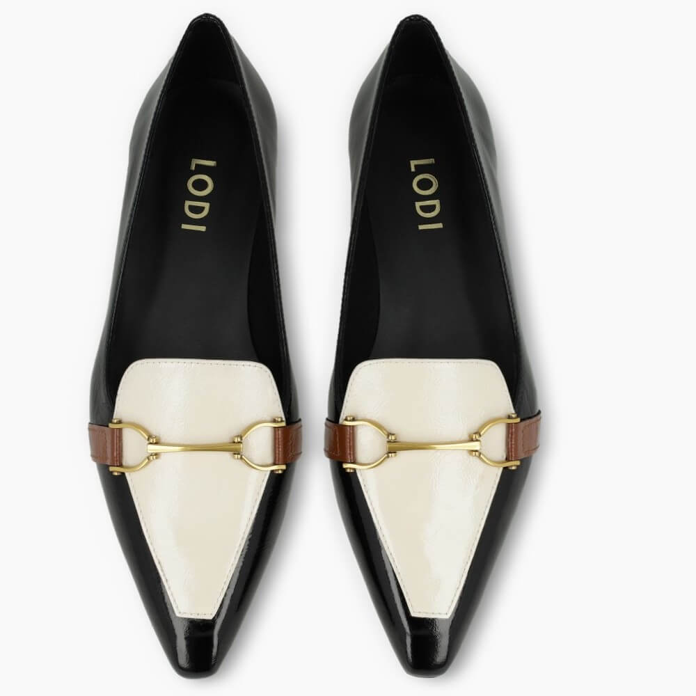 Black and white shoe with gold and brown strap on a white background LODI BED5530 Leather Loafer Black & Cream