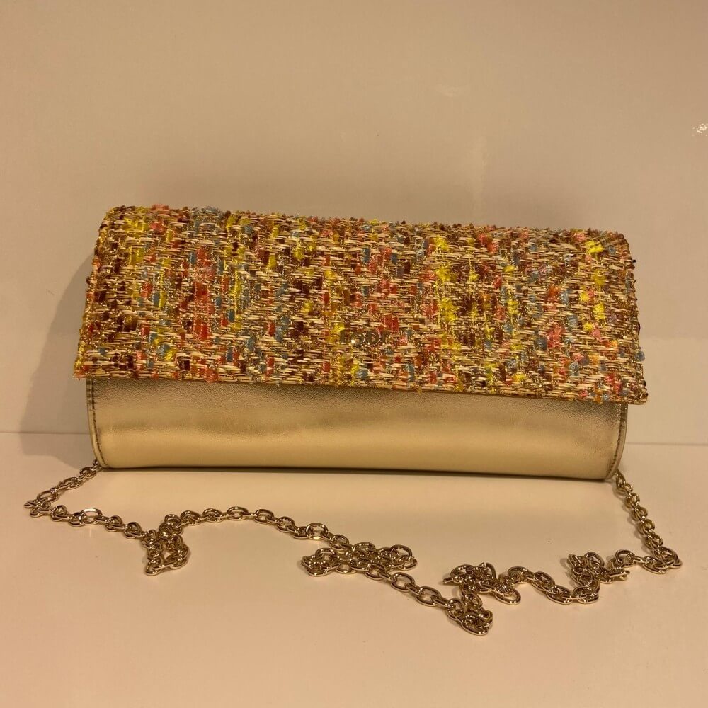 Lodi Gold And Raffia clutch bag