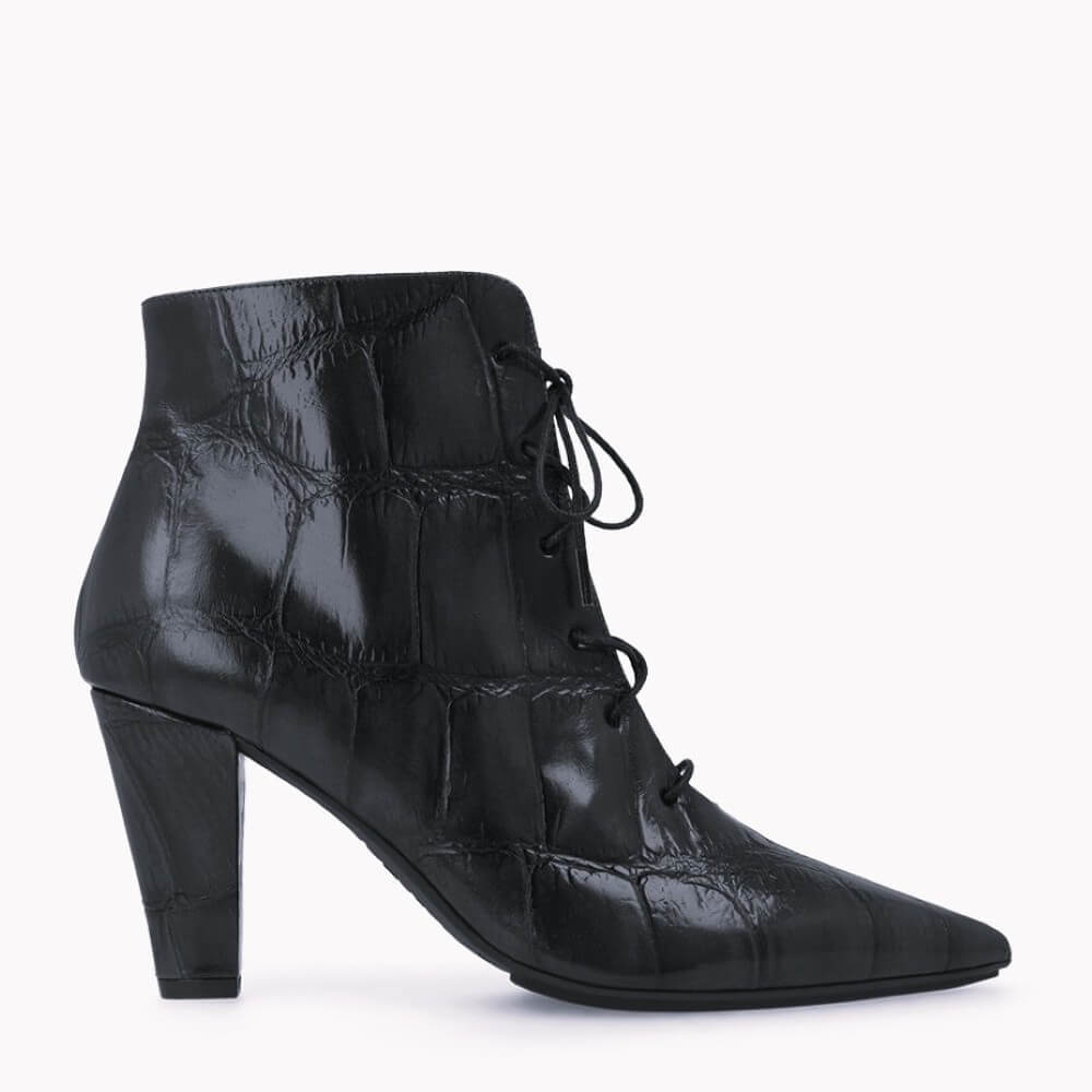 A Lodi  black high-heeled ankle boot with a pointed toe, lace-up front, and glossy crocodile-embossed texture, shown against a plain white background.