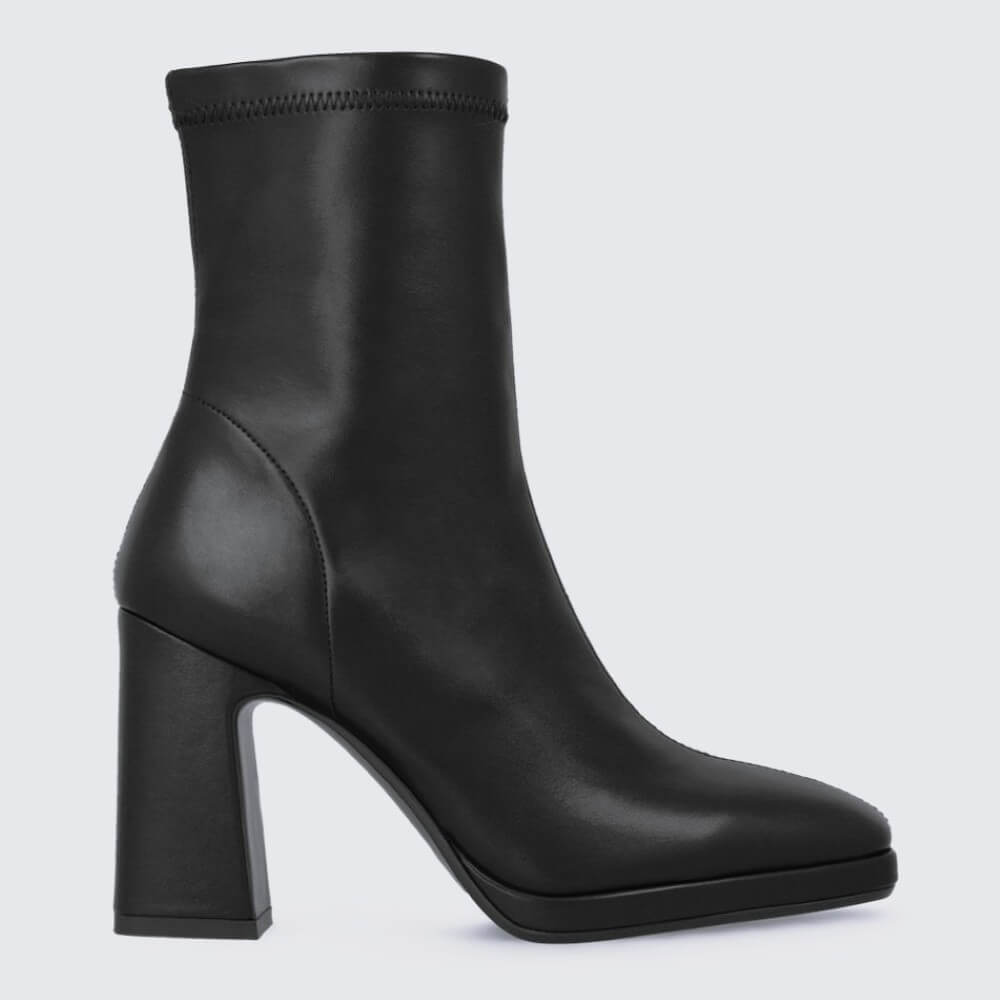 Black ankle boot with a block heel on a light gray background Lodi A-LAIRA Ankle Boots