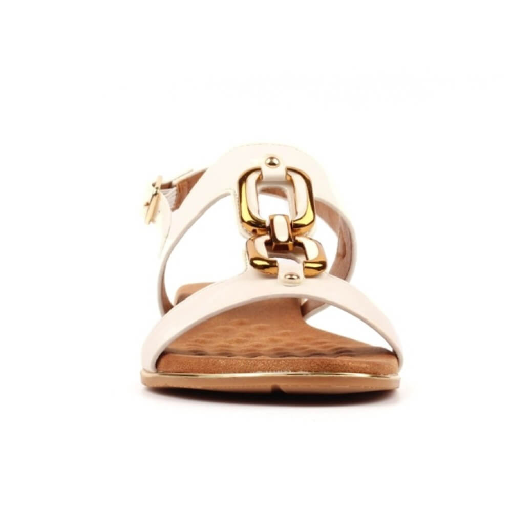 Lunar White sandal with gold buckle on a white background