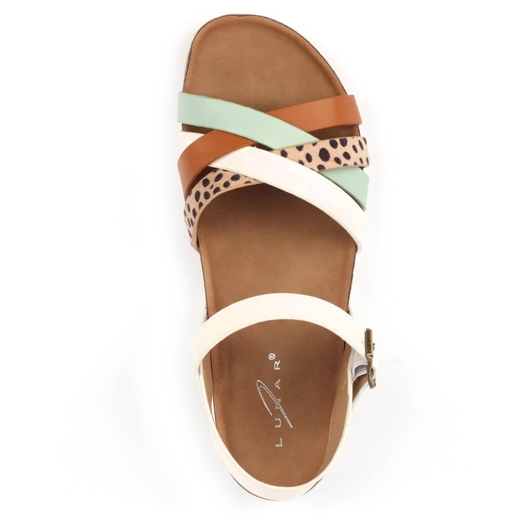 Lunar Multi-coloured sandal with a cork wedge sole on a white 
