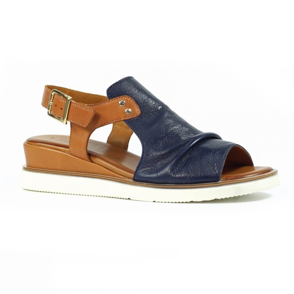 Lunar Navy sandal with brown straps on a white background
