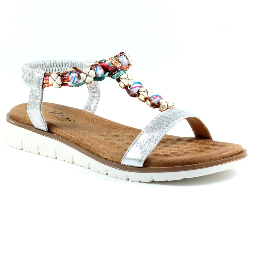 Lunar Silver sandal with colourful beaded strap on a white background