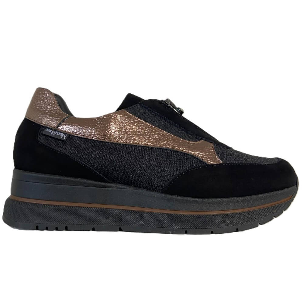 A Marco Moreo black slip-on platform shoe with a metallic bronze textured leather panel on the side and heel, shown in profile against a white background.