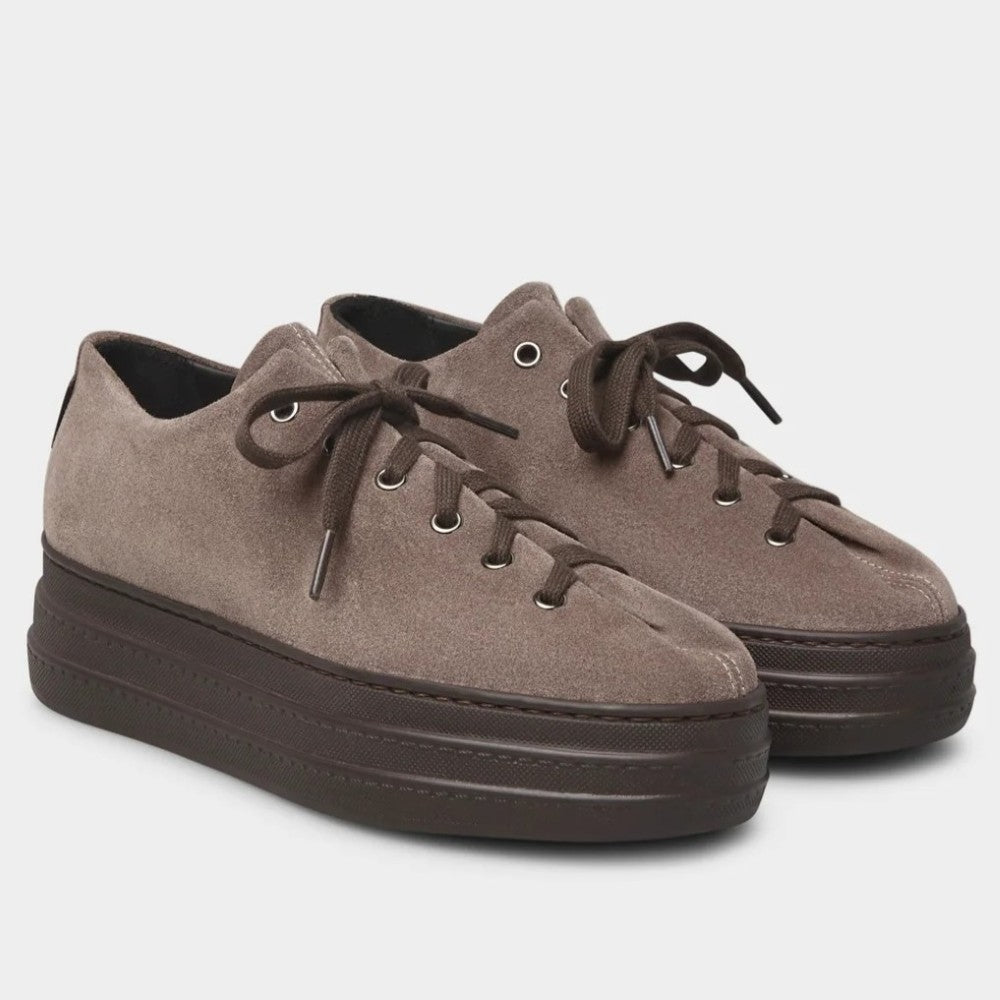 A pair of Marco Moreo low-top platform sneakers in a taupe-brown suede with matching laces and thick dark brown platform soles, shown on a light grey background.