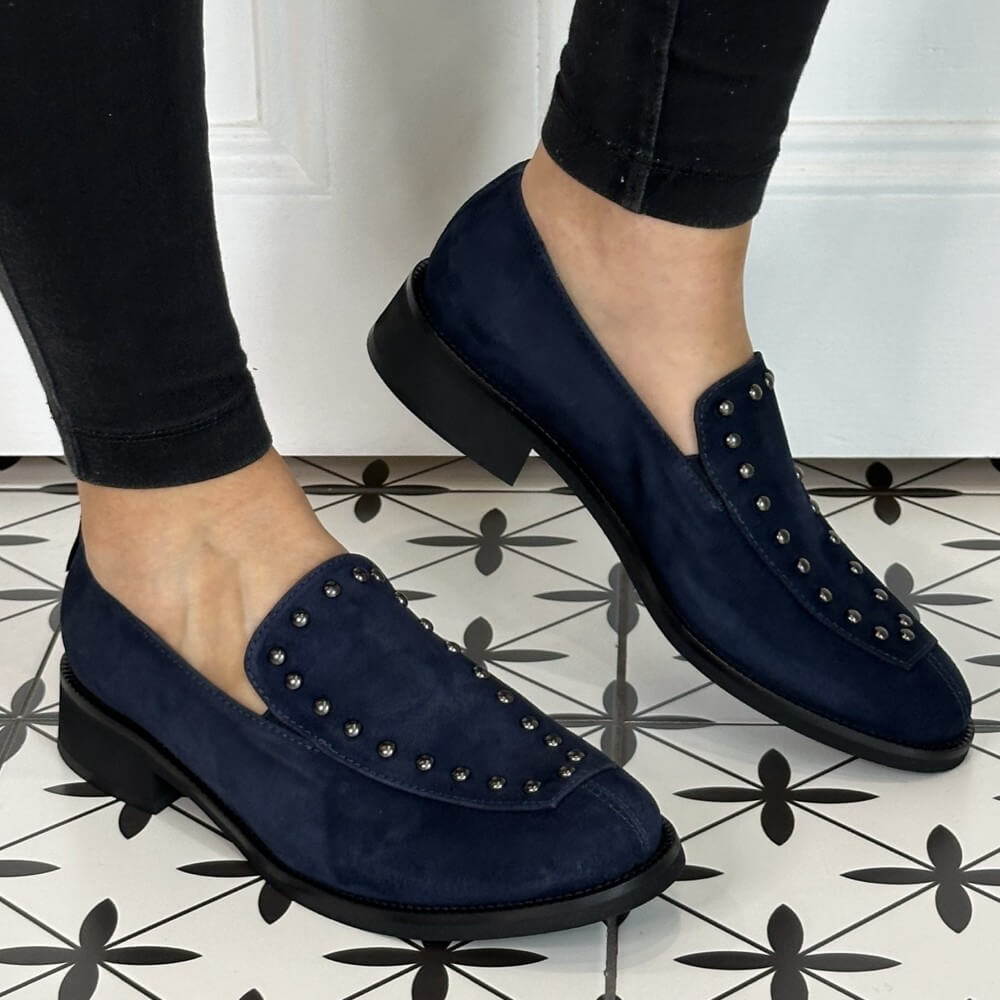 Navy blue loafers with studded details worn indoors on a patterned floor.  Marco Moreo Suede Loafer A070 