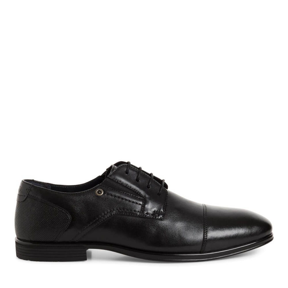 Marco Tozzi Black leather dress shoe on a white background