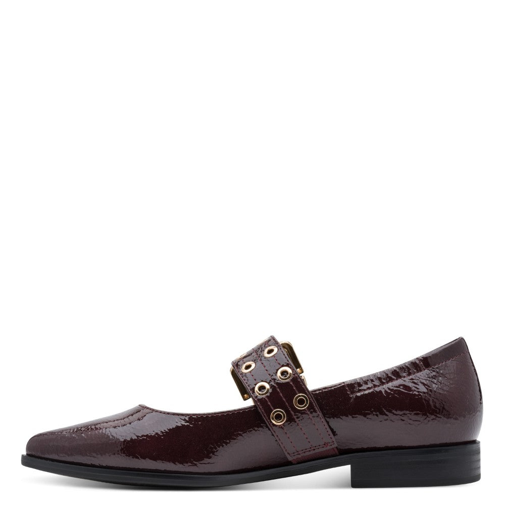 Marco Tozzi wine patent leather shoe with gold buckle on a white background