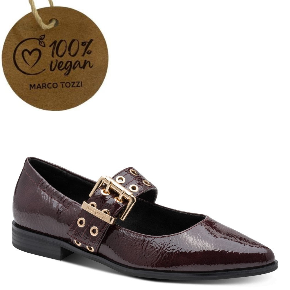 Marco Tozzi wine patent leather shoe with gold buckle and '100% Vegan' tag on a white background