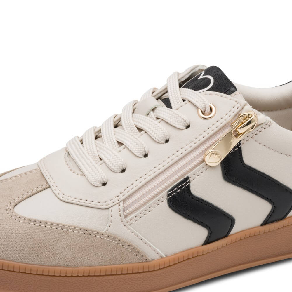 Marco Tozzi Ivory sneaker with black accents and brown sole 