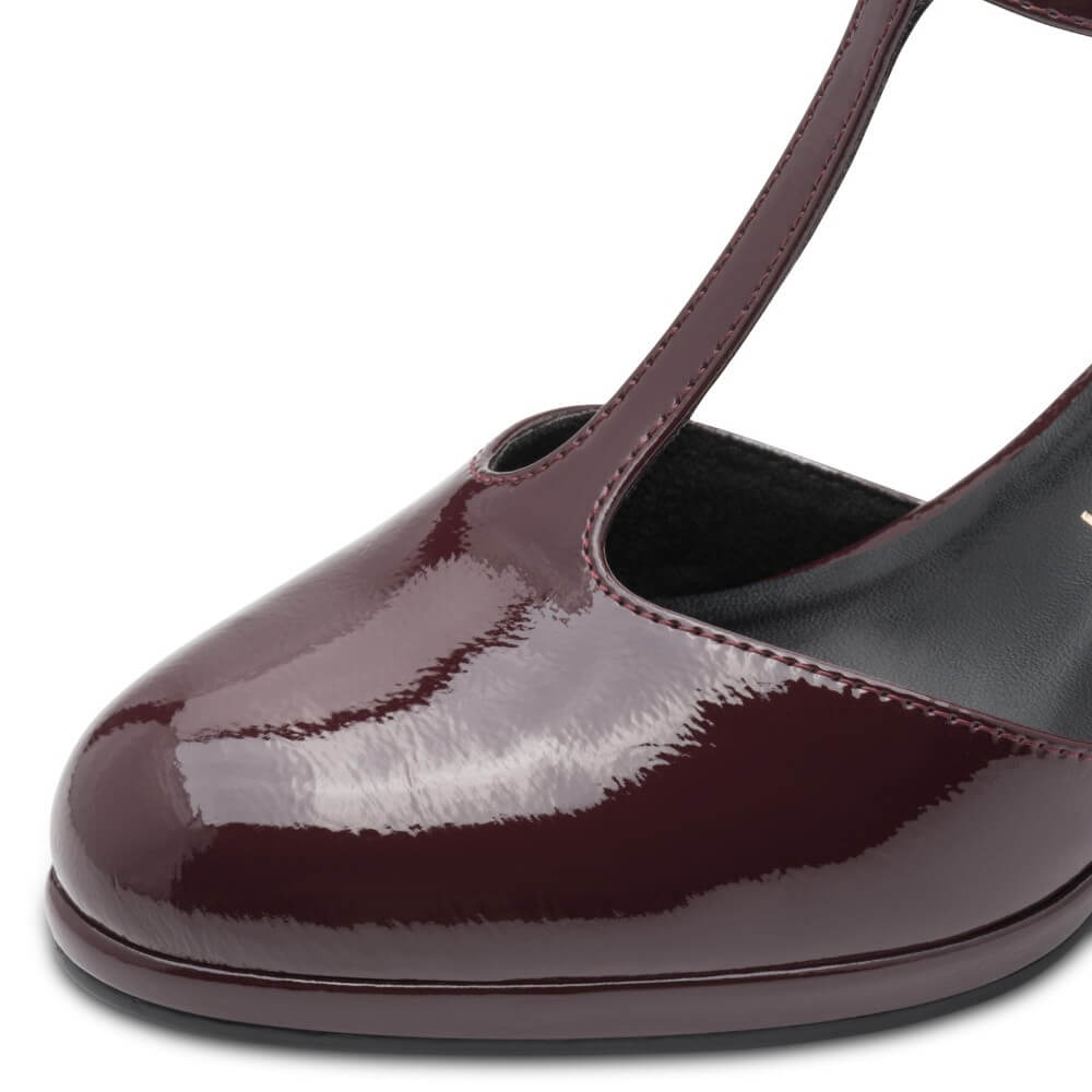 Marco Tozzi Bordeaux Patent Vegan T-Bar Court Shoe on a white background