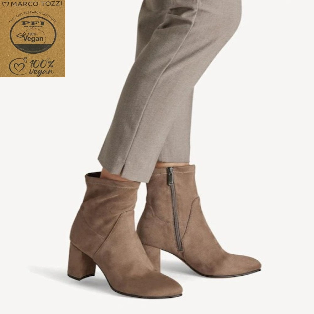 Person wearing Marco Tozzi 2-25369 Vegan Ankle Boot Stone