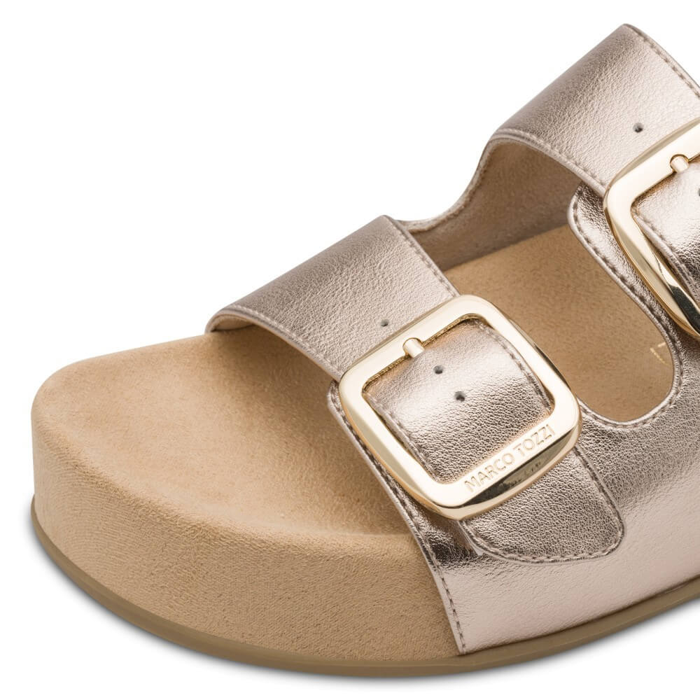 Marco Tozzi old sandal with beige sole on a white background