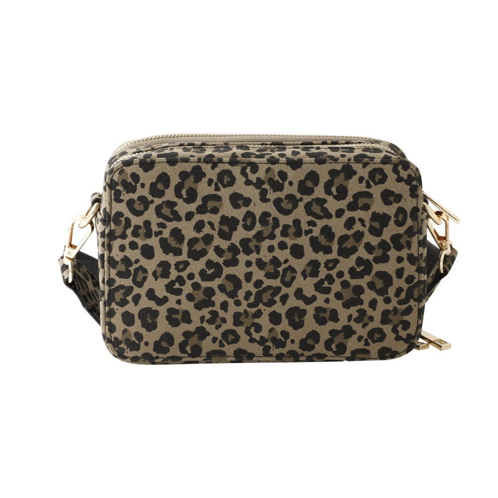 A Marco Tozzi leopard print crossbody camera bag with a top zipper and gold-tone hardware, shown  on a white background.
