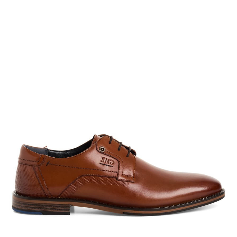Marco Tozzi Brown leather dress shoe on a white background