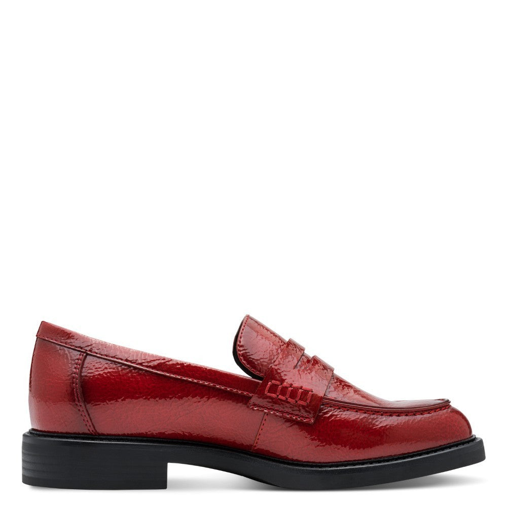 Red loafer shoe with a '100% Vegan' label by Marco Tozzi on a white background Marco Tozzi Patent Vegan Loafer 2-24308