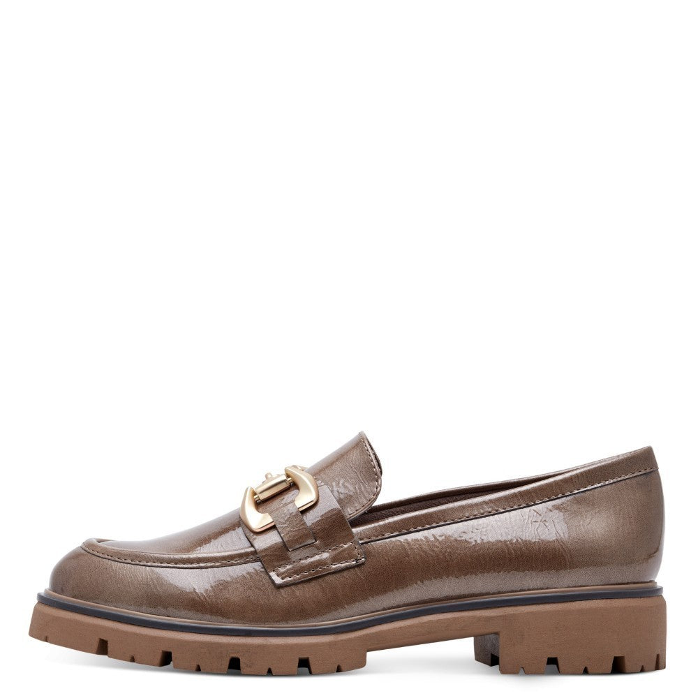 Brown loafer shoe with gold buckle and '100% Vegan' label on a white background Marco Tozzi Vegan Patent Loafer 2-24700 Taupe