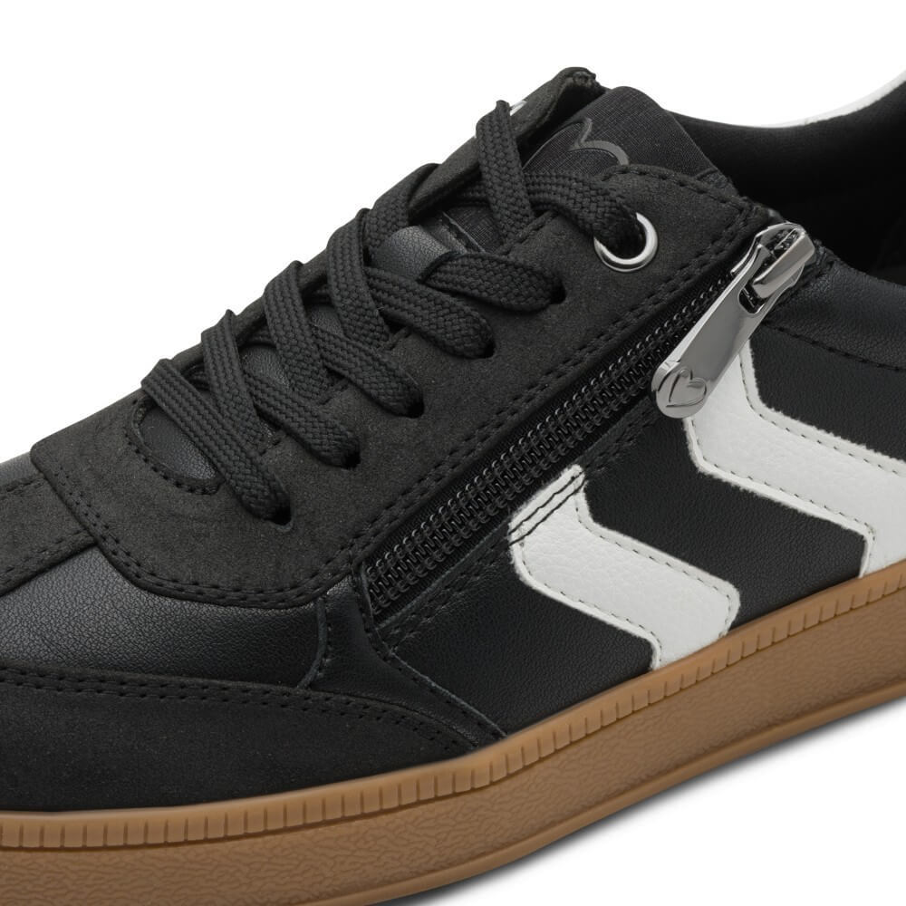 Black and white sneaker with brown sole and '100% Vegan' label on a white background Marco Tozzi Vegan Sneakers 2-23739-BLACK