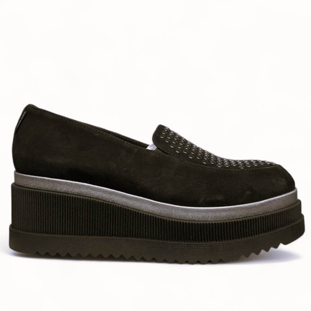 Black suede platform loafer shoe with silver studs on a white background