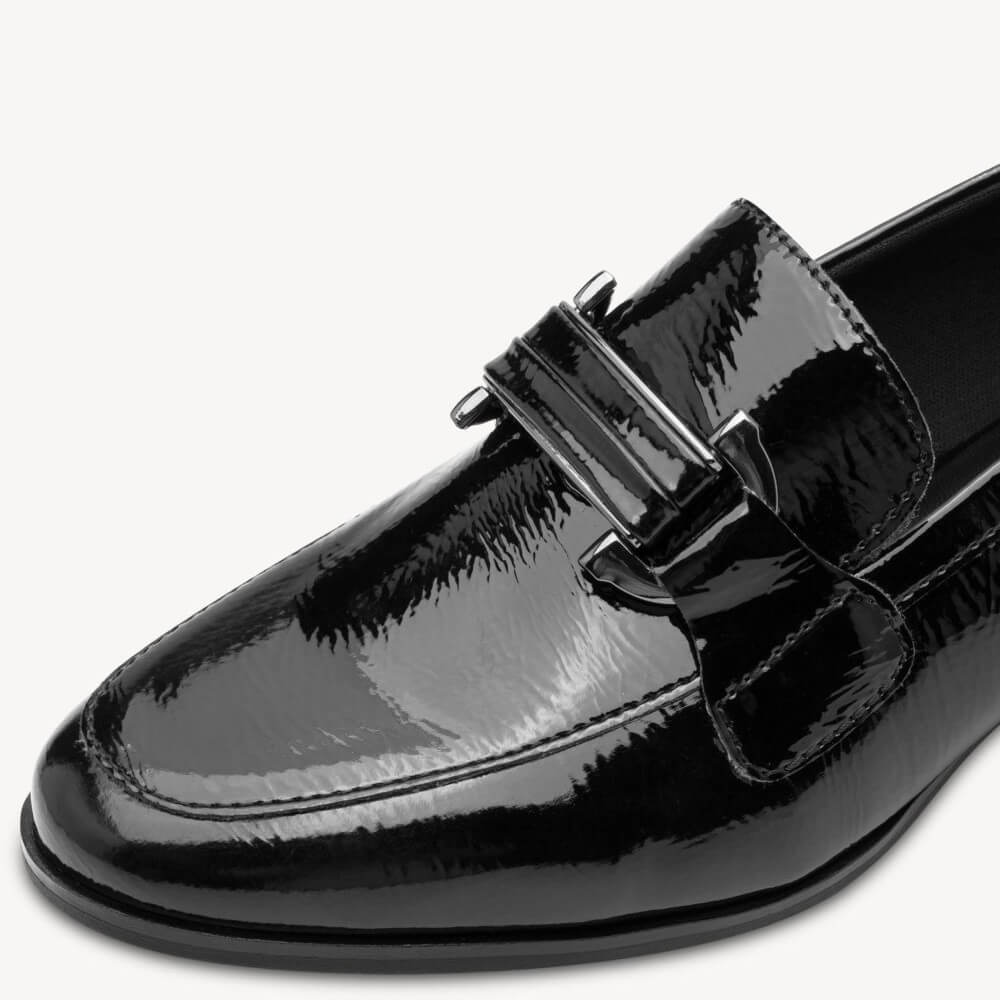 Black patent leather loafer with a buckle on a white background Marco Tozzi Vegan Loafer 2-24250-BLACK