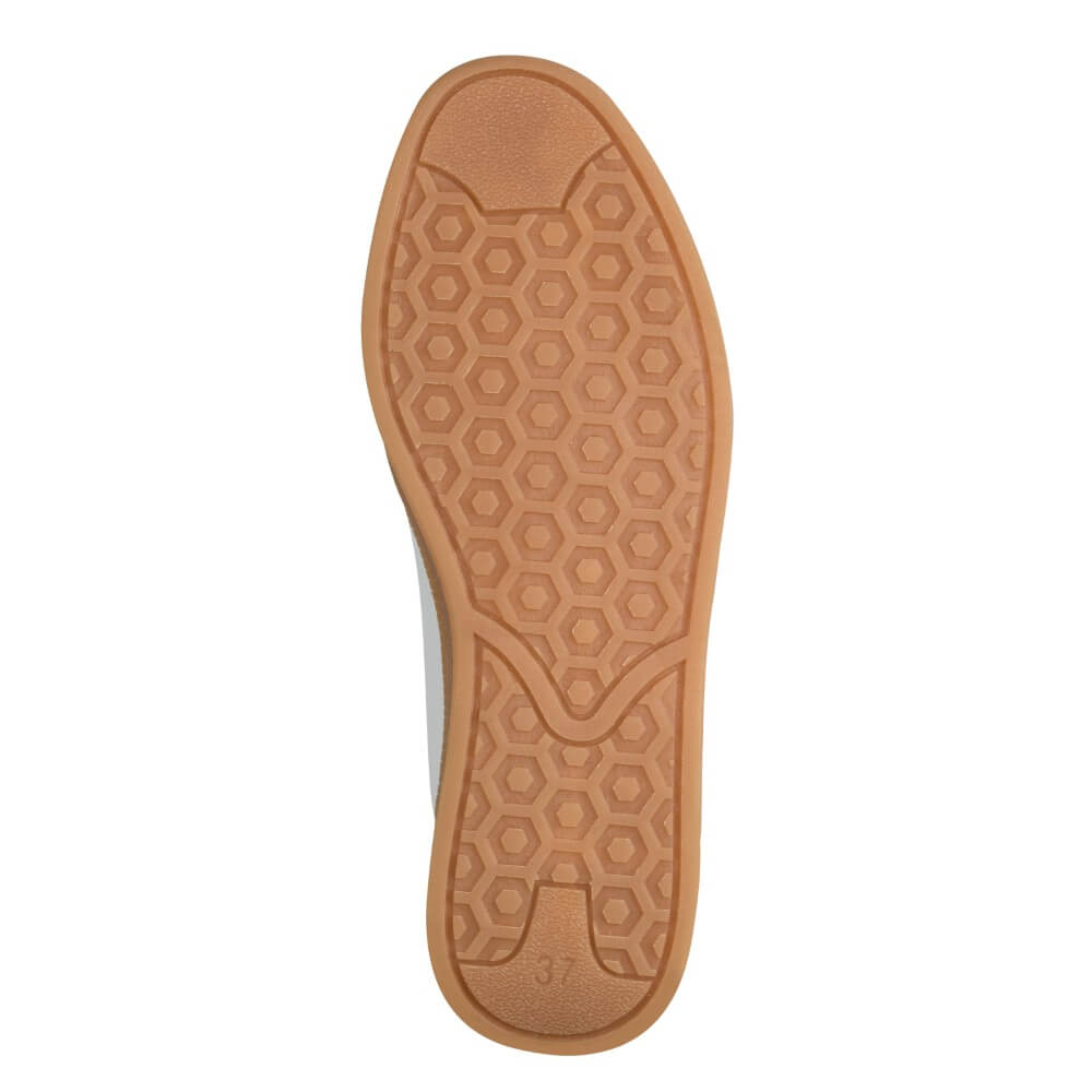 Brown shoe sole with hexagonal pattern on a white background