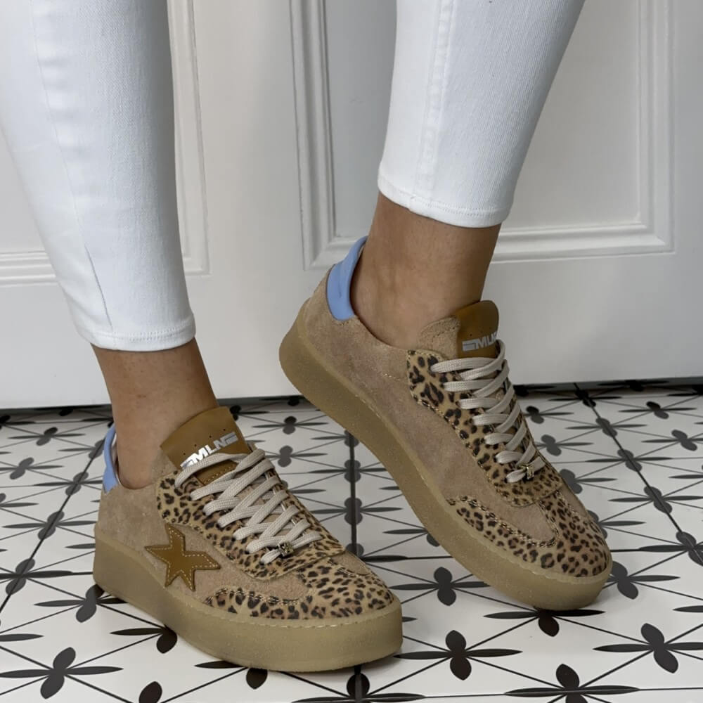 Meline Leopard print trainers worn with white jeans on tile floor