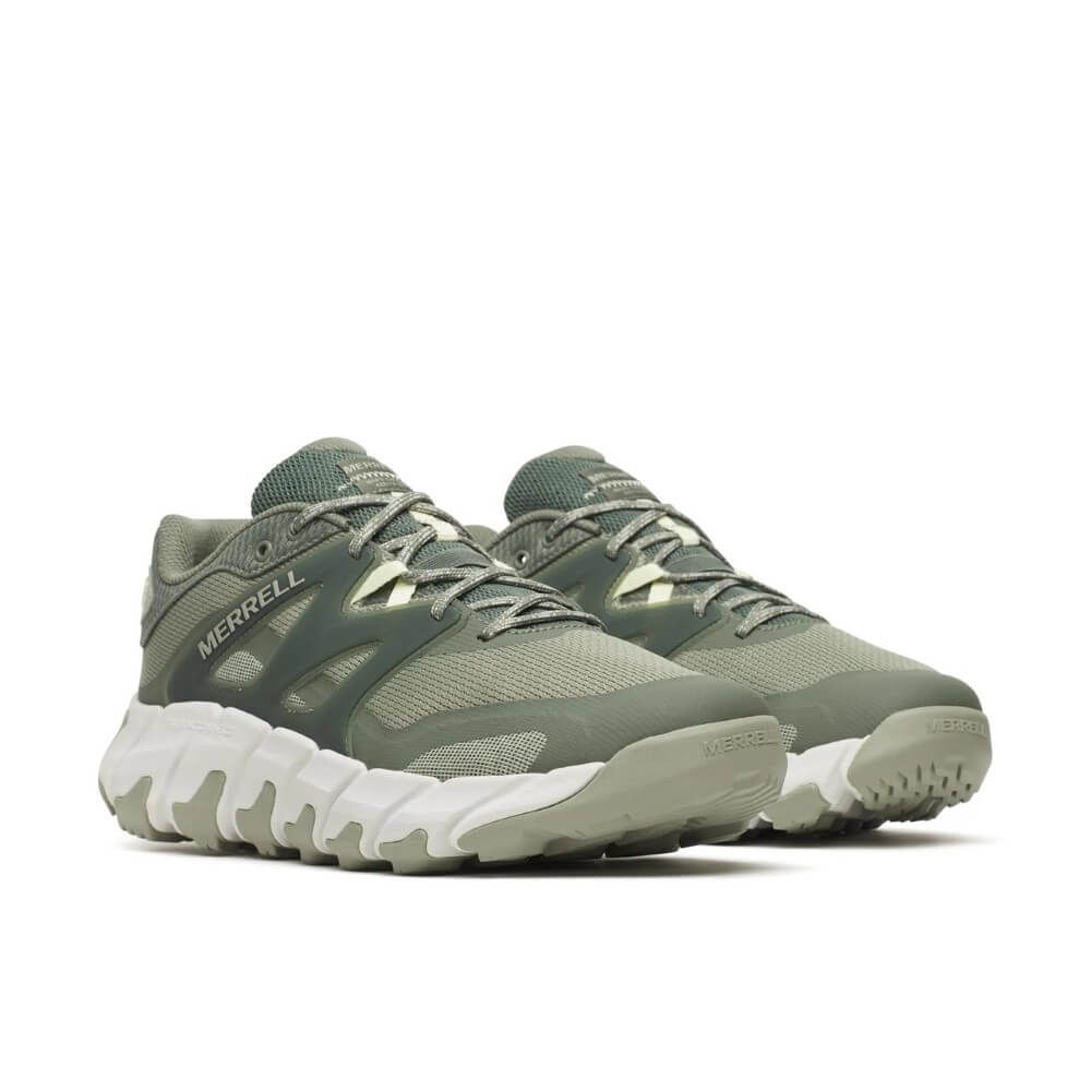 Merrell Green Walking shoes with white soles on a white background