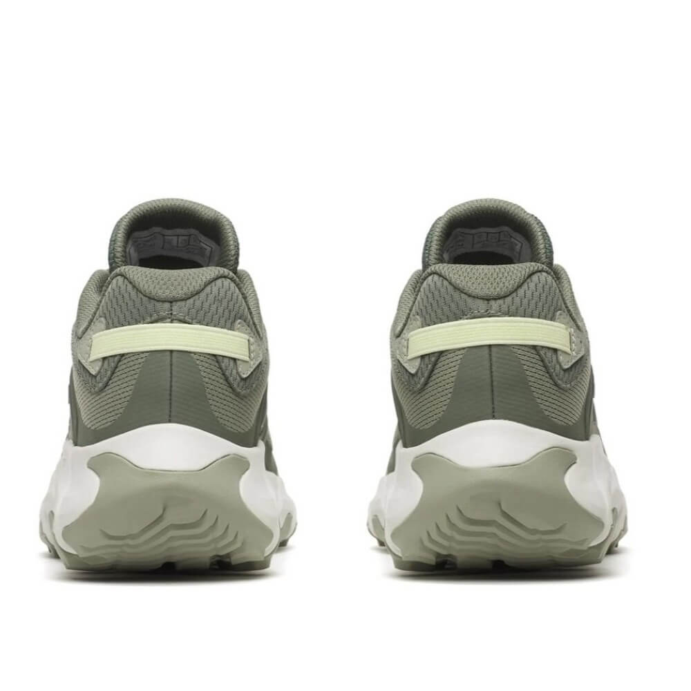 Merrell Green Walking shoe with white sole on a white background