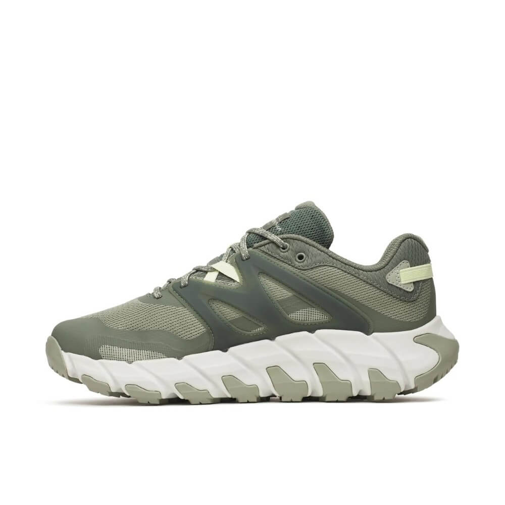 Merrell Green Walking shoe with white sole on a white background