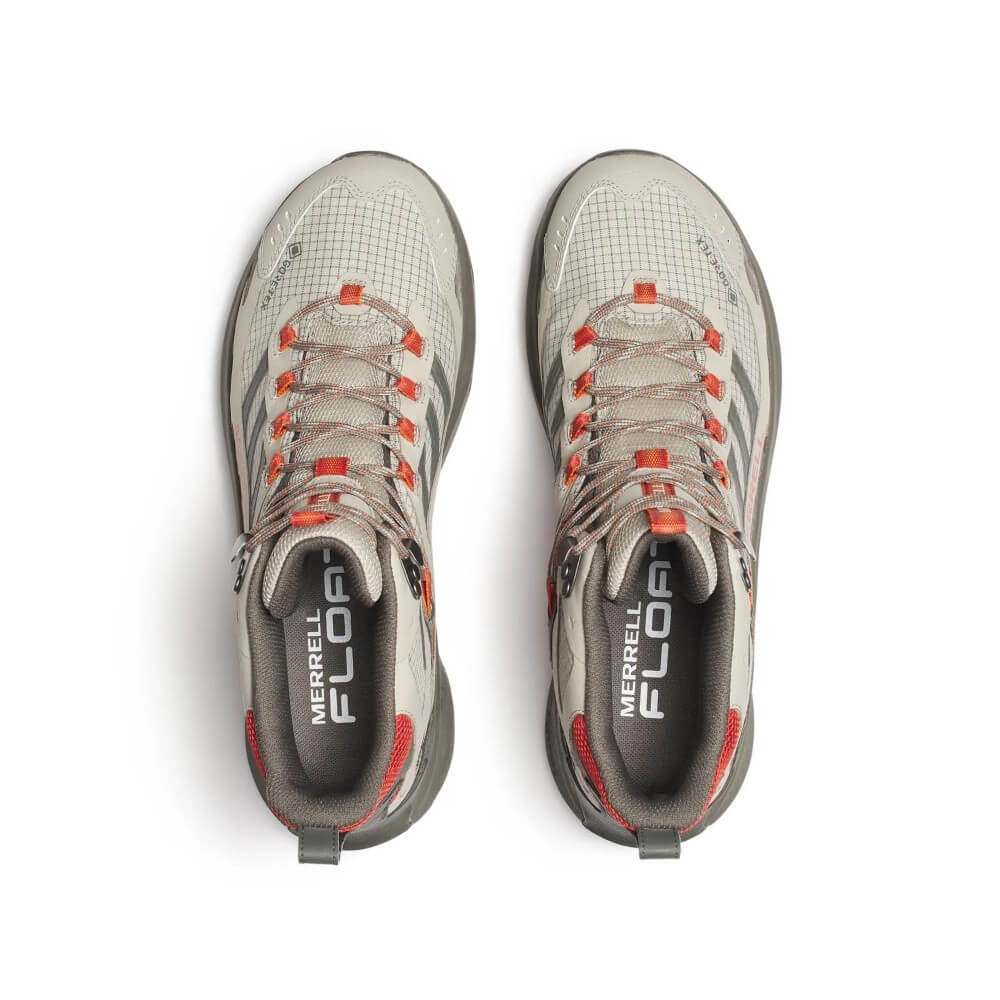 A pair of Merrell mid-height hiking boots in light grey and dark grey with orange-red accents, shown on a white background with a black and gold Gore-Tex 