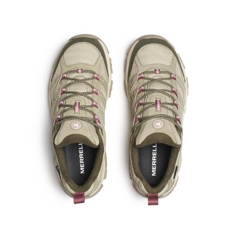 A pair of Merrell hiking shoes in olive green and beige with light pink accents, shown in profile against a white background.  