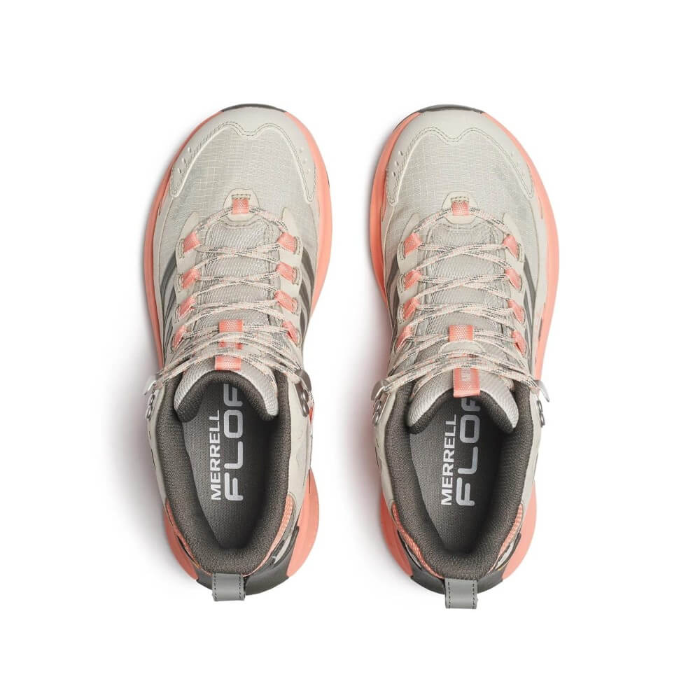 A pair of Merrell hiking shoes shown from a top-down view on a clean white background. The shoes feature a light grey suede and mesh upper with coral orange accents on the laces, heel pull tabs, and midsole.