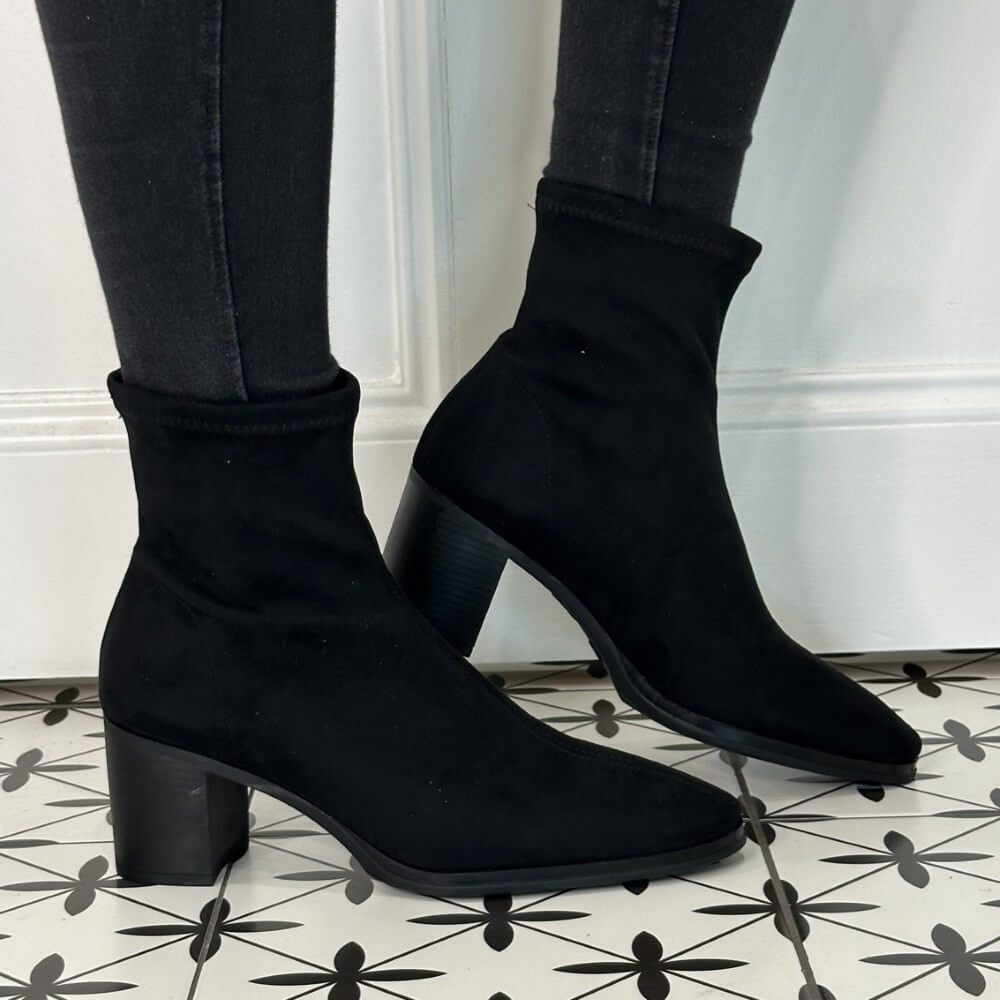 Black elastic Block heel boot worn with black jeans