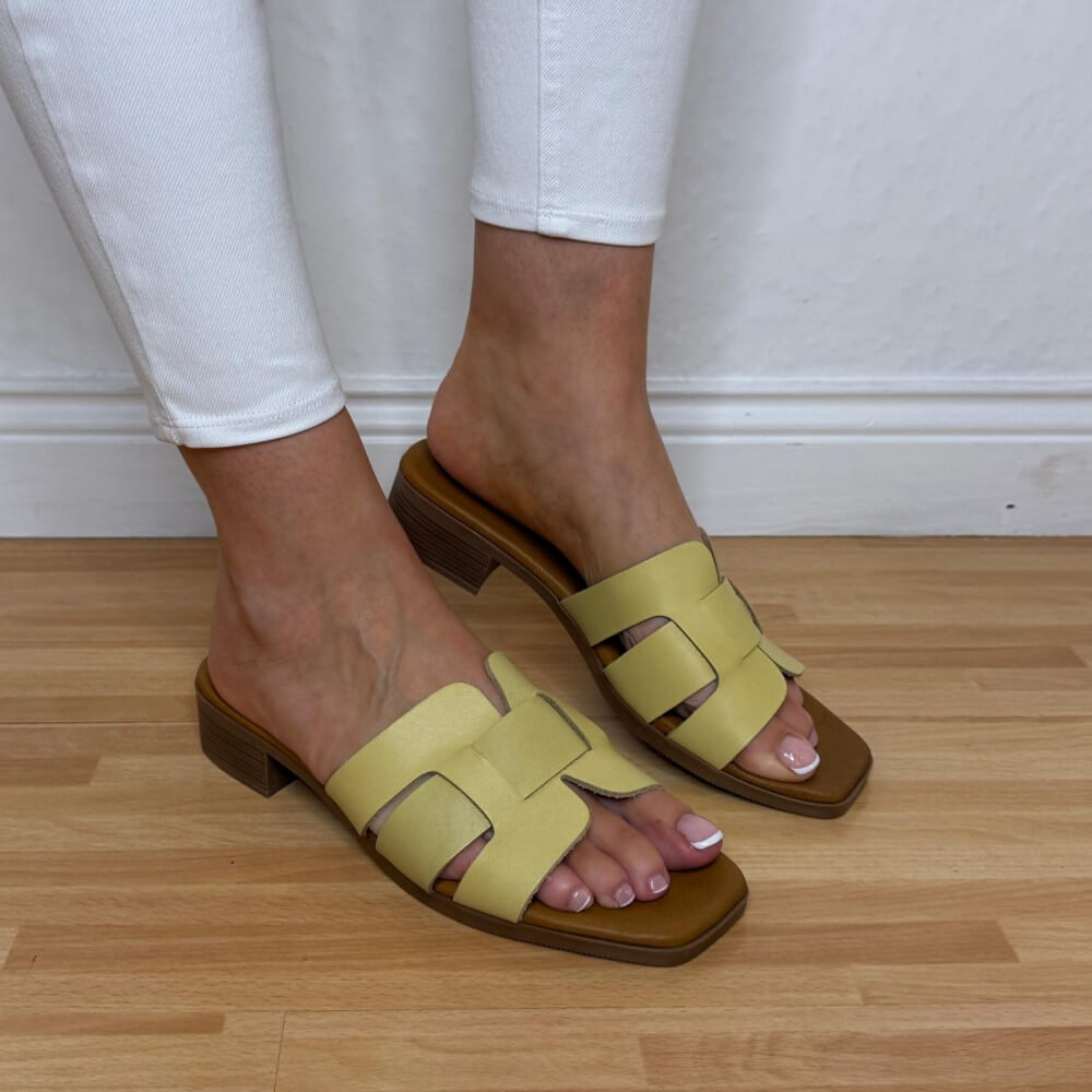 Oh My Sandals 5880 Lemon Yellow Leather sandals with brown soles worn on a wooden floor.