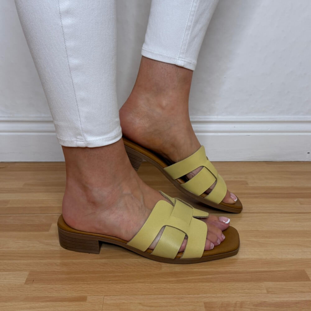 Oh My Sandals 5880 Lemon Yellow Leather sandals with brown soles worn on a wooden floor.