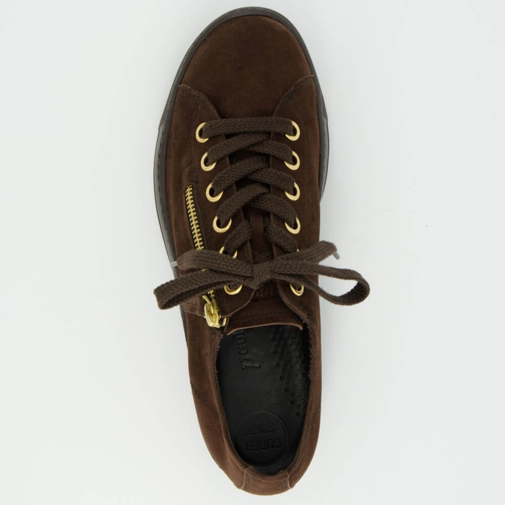 A Paul Green dark brown suede low-top sneaker with a matching dark brown platform sole, brown laces, and gold-tone metal eyelets and zipper accents, shown on a light grey background.