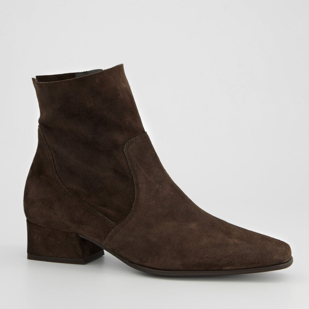 A Paul Green dark brown suede ankle boot with a low block heel and pointed toe, shown from a side profile on a light grey background.
