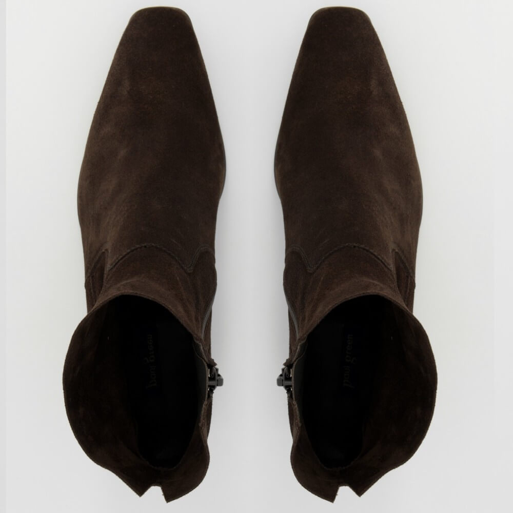A pair of Paul Greendark brown suede ankle boots with pointed toes, shown from a top-down view on a light grey background.