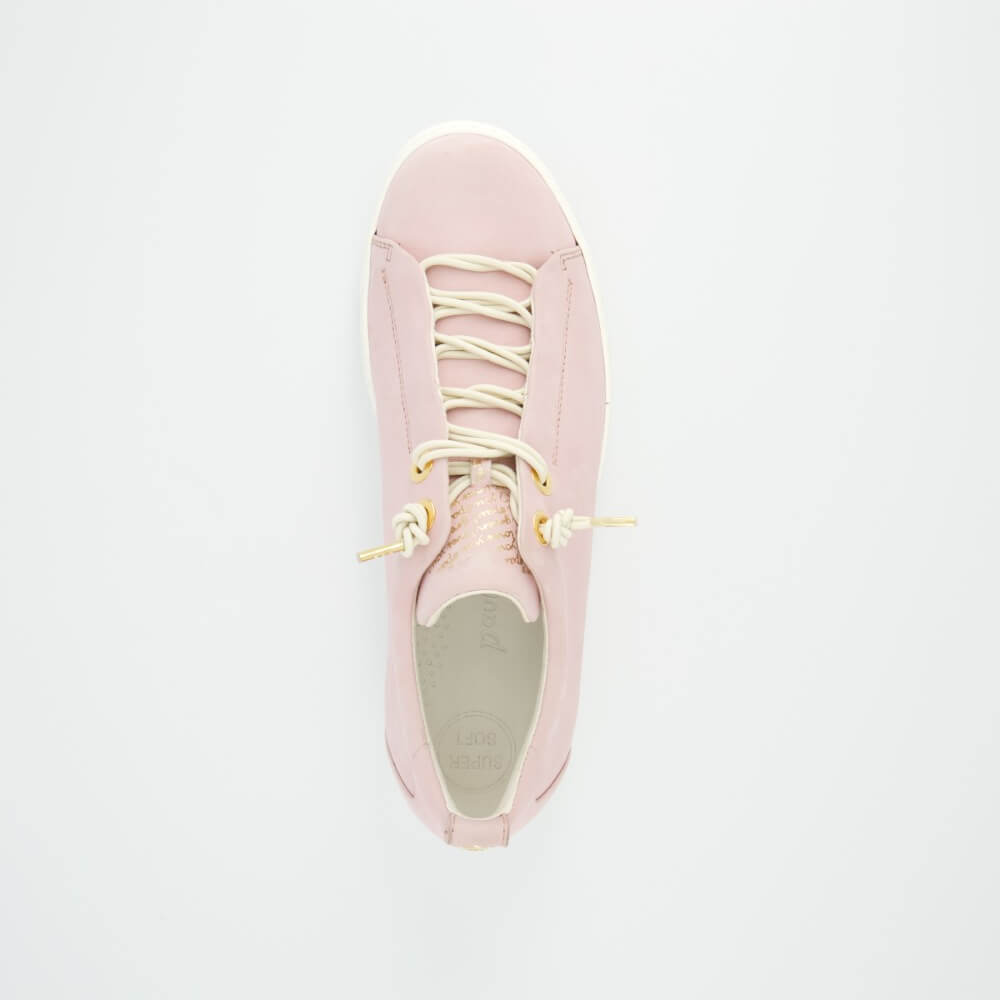 Pink sneaker with yellow laces on a light gray background