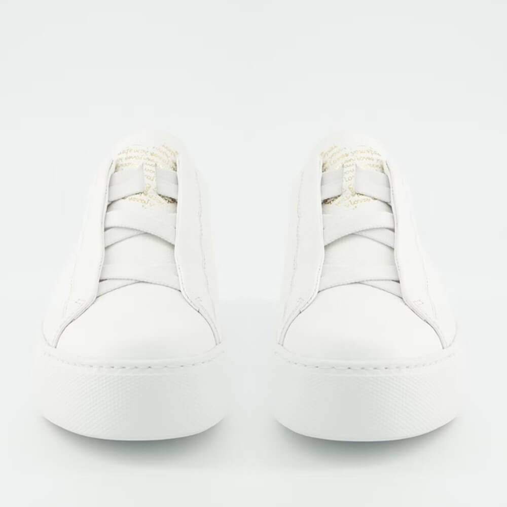 white leather slip-on trainers