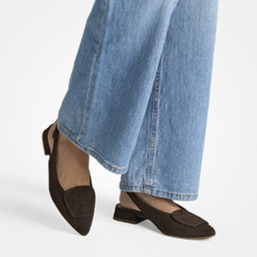 Paul Green 6090 Brown loafers worn with blue jeans on a white background
