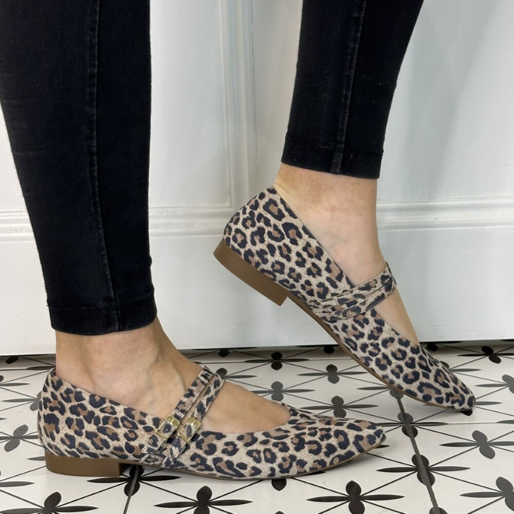 person wearing leopard print Maryjane Ballerinas
