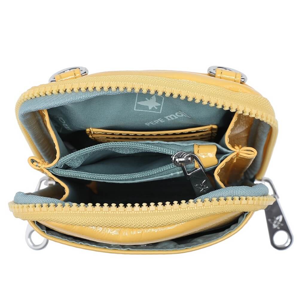 Yellow and teal pouch with multiple zippers on a white background