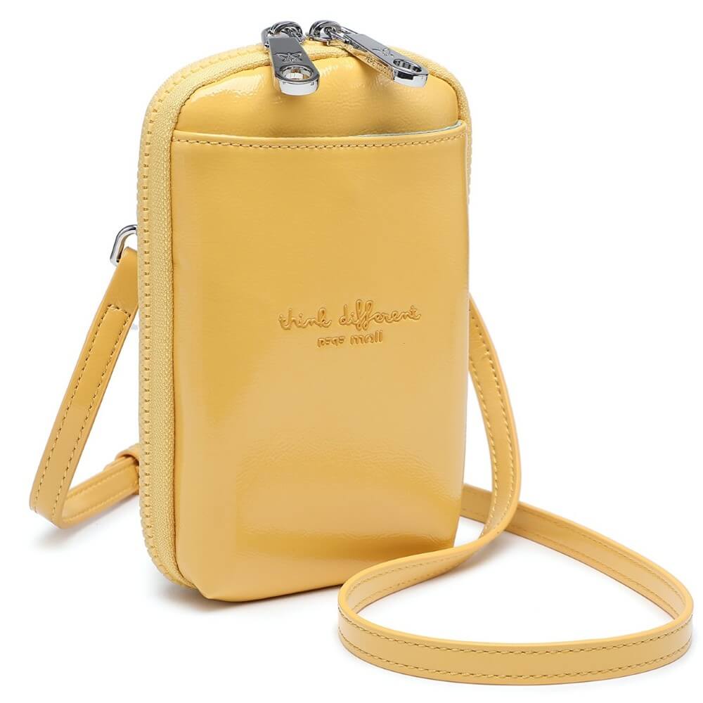 Yellow crossbody bag with a strap on a white background, featuring Pepe Moll branding. Vegan