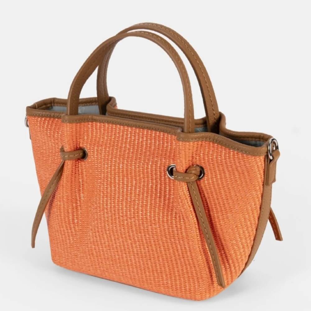 Orange woven handbag with brown handles and trim on a light gray background, featuring 'Pepe Moll' brand. Vegan
