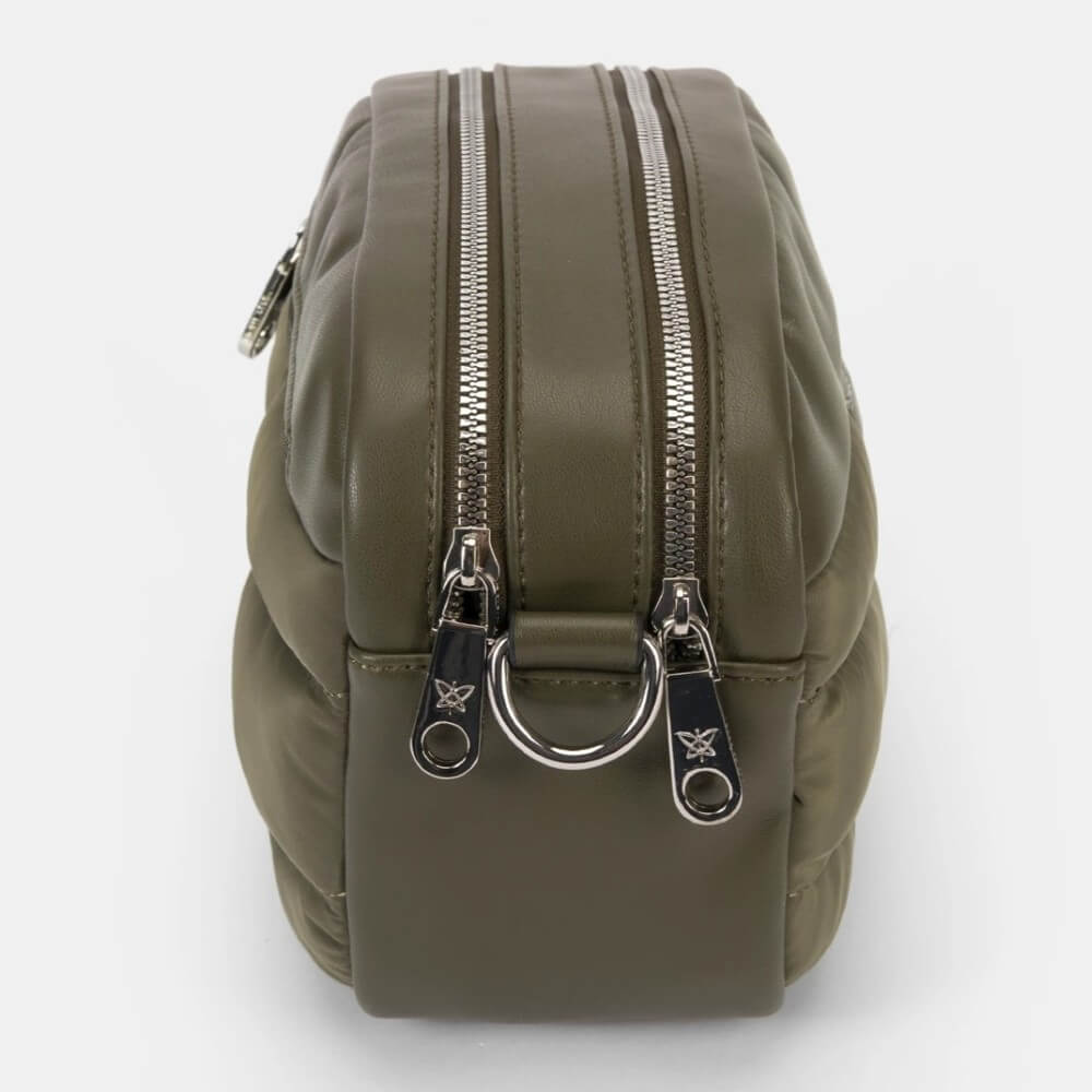 Green crossbody with zippers on a white background